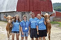 Don Langrehr – pictured with his family, (from left) daughter, Jenna; wife, Kathy; and daughter, Kirstie – received the American Master Breeder Award during the National Guernsey Convention June 25-30. The family operates Lang-Haven Farm near West Salem, Wis. <br /><!-- 1upcrlf -->PHOTO BY LABECCA SCHOTT