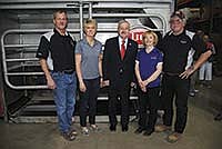The owners of dairy equipment firm Fitzgerald, Inc. of Elkader, Iowa – Mike and Kristin Fitzgerald (left) and Joyce and Al Prier – hosted Governor Terry Branstad on April 16.<br /><!-- 1upcrlf -->PHOTO BY RON JOHNSON