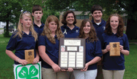 Fayette County was undefeated in winning the intermediate division of the 4-H Dairy Quiz Bowl Contest. In front, from left, are team members Dayle Lantzky, Nichole Fagle, Molly Schmitt and Kelli Steinlage. In back is team member Brandt Wade, coach Marilyn Steffens and team member Joey Adams. Katie Steinlage and Diana Stewart assisted in coaching the team. (photo submitted)