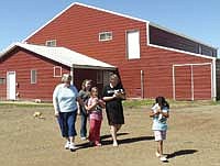 The Deutz dairy barn was rebuilt after a July 1, 2011, storm tore its roof off. <br /><!-- 1upcrlf -->PHOTO BY RUTH KLOSSNER