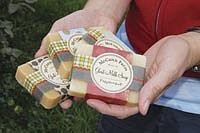 The McCanns make 15 different varieties of goat milk soap. Brian McCann takes charge of soap making, learning the tricks of the trade, while Kärin does the hand-packaging and attends the farmers’ markets, where they sell the majority of their soaps. Their goal is to sell 1,000 bars of soap per year.<br /><!-- 1upcrlf -->PHOTO BY JENNIFER BURGGRAFF