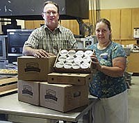 Bob Howard, pictured with West Central Food Service Manager, Wilma Miller, works with local schools as a part of his job with Country View Dairy.<br /><!-- 1upcrlf -->PHOTO SUBMITTED
